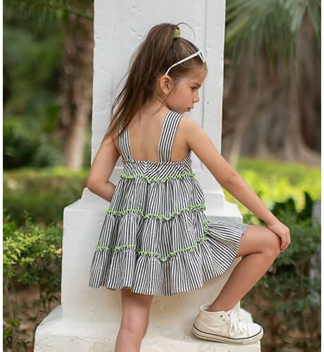 Vestido niña a rayas volantes ribeteado en color lima de Nekenia | Aiana Larocca